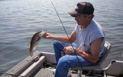 <p>Steve with another good crappie from 'the wall' in December</p>